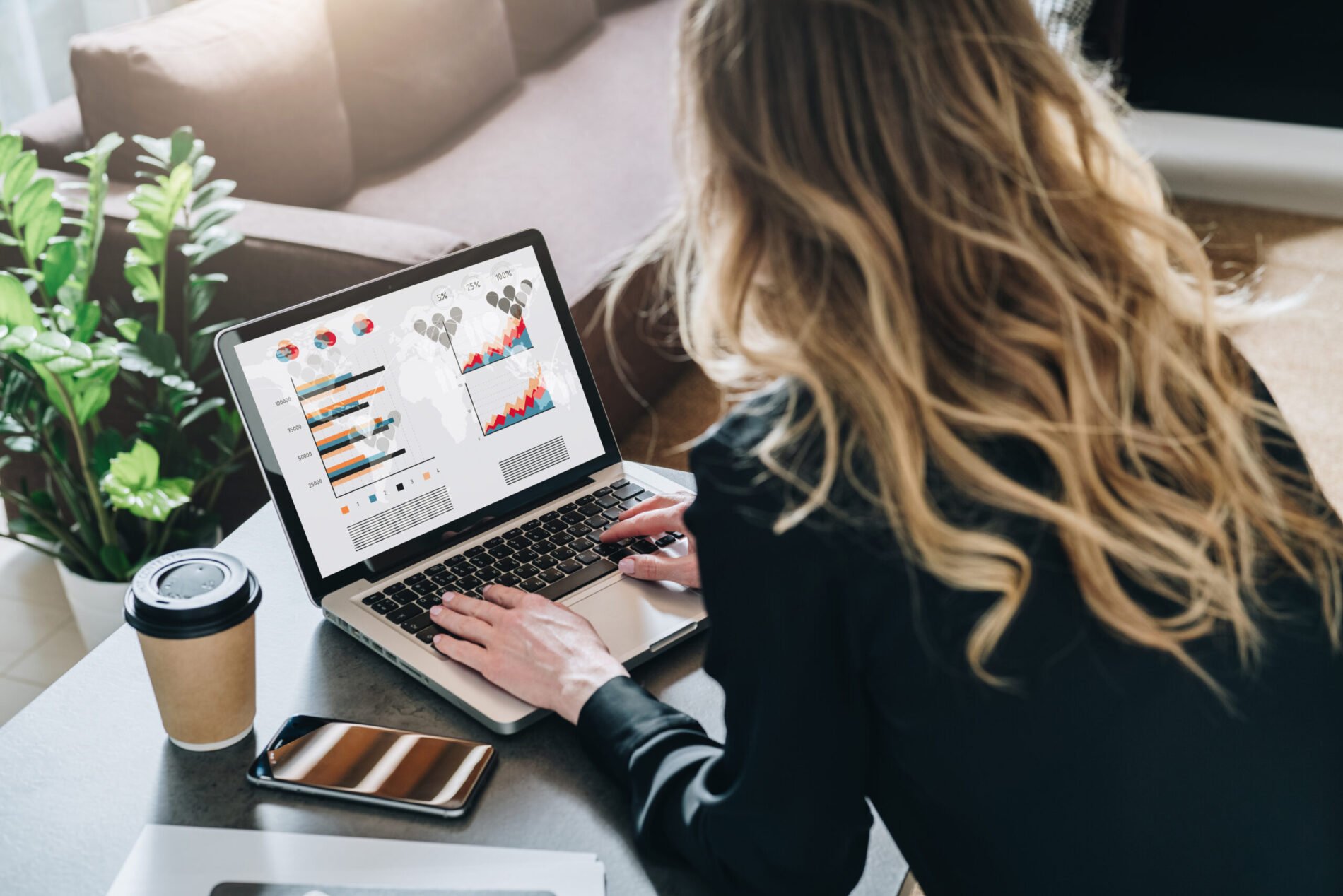 Woman analyzing data on computer