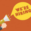 A megaphone with the words we're hiring.